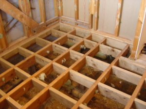 Bathroom Floor joists with solid nogs forming grid pattern